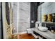 Elegant bathroom featuring modern fixtures and marble tile at 11618 Vinci Dr, Windermere, FL 34786