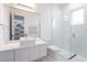 Modern bathroom with white cabinets, a glass shower, and a floating sink at 11618 Vinci Dr, Windermere, FL 34786