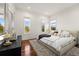 Primary bedroom with a king-size bed and hardwood floors at 11618 Vinci Dr, Windermere, FL 34786