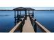 Private dock with gazebo offering serene lake views at 11618 Vinci Dr, Windermere, FL 34786