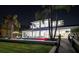 Backyard view of home with pool and dock at 11618 Vinci Dr, Windermere, FL 34786