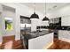 Sleek kitchen featuring stainless steel appliances and marble countertops at 11618 Vinci Dr, Windermere, FL 34786