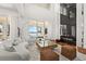 Bright living room with modern fireplace and water views at 11618 Vinci Dr, Windermere, FL 34786