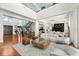 Spacious living area with high ceilings, fireplace and water views at 11618 Vinci Dr, Windermere, FL 34786