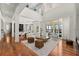 Open concept living space with hardwood floors and water views at 11618 Vinci Dr, Windermere, FL 34786