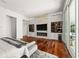 Main bedroom with a built in fireplace and large TV at 11618 Vinci Dr, Windermere, FL 34786
