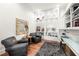 Home office with built-in shelves and comfortable seating at 11618 Vinci Dr, Windermere, FL 34786
