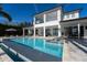 Large rectangular pool with spa and lake view at 11618 Vinci Dr, Windermere, FL 34786