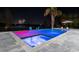 Luxury pool and spa with colorful night lighting at 11618 Vinci Dr, Windermere, FL 34786