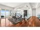Spacious sitting area with lake views, hardwood floors, and comfortable seating at 11618 Vinci Dr, Windermere, FL 34786