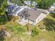 Aerial view showing house, backyard and surrounding area at 120 Crooked Pine Rd, Port Orange, FL 32128