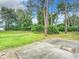 Large backyard with grassy area and patio, great for outdoor entertaining at 120 Crooked Pine Rd, Port Orange, FL 32128