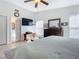 Bright bedroom with a king-size bed and bathroom access at 120 Crooked Pine Rd, Port Orange, FL 32128