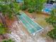 Community shuffleboard courts nestled among the trees at 120 Crooked Pine Rd, Port Orange, FL 32128