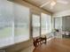 Spacious sunroom with large windows and plenty of natural light at 120 Crooked Pine Rd, Port Orange, FL 32128
