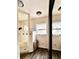 Clean bathroom with walk-in shower, window, and linen closet at 12151 Se 86Th Ave, Belleview, FL 34420
