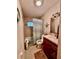 Clean bathroom with a shower/tub combo and updated vanity at 12151 Se 86Th Ave, Belleview, FL 34420
