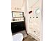 Updated bathroom with walk-in shower and stylish vanity at 12151 Se 86Th Ave, Belleview, FL 34420