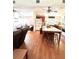 Open concept kitchen with island and hardwood floors at 12151 Se 86Th Ave, Belleview, FL 34420