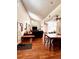 Open living room with hardwood floors and vaulted ceilings at 12151 Se 86Th Ave, Belleview, FL 34420