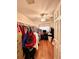 Home office with wood floors, closet, and ceiling fan at 12151 Se 86Th Ave, Belleview, FL 34420