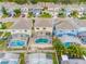 Aerial view of houses with fenced-in pools at 1266 Sandestin Way, Orlando, FL 32824