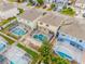 Aerial view of house and neighborhood pools at 1266 Sandestin Way, Orlando, FL 32824