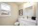 Updated bathroom with white vanity, quartz countertop and modern fixtures at 1266 Sandestin Way, Orlando, FL 32824