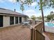 Community deck with seating area overlooking the pool at 127 Springwood Cir # A, Longwood, FL 32750