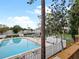 Inviting community pool with tennis courts nearby at 127 Springwood Cir # A, Longwood, FL 32750