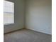 Spacious bedroom with window and neutral decor at 16704 Point Rock Dr, Winter Garden, FL 34787