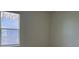 Bedroom with a window and neutral wall colors at 16704 Point Rock Dr, Winter Garden, FL 34787