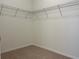 Walk-in closet with wire shelving at 16704 Point Rock Dr, Winter Garden, FL 34787