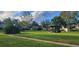 Community area with gazebo and lush green landscaping at 1695 Lee Rd # A209, Winter Park, FL 32789