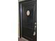 Building entrance with keyless entry and unit number at 1695 Lee Rd # A209, Winter Park, FL 32789