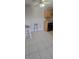 Kitchen with tile floors and wood cabinets at 1695 Lee Rd # A209, Winter Park, FL 32789