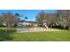 Community playground with swings and climbing structures at 1695 Lee Rd # A209, Winter Park, FL 32789