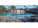 Community swimming pool with lounge chairs at 1695 Lee Rd # A209, Winter Park, FL 32789
