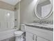 Bathroom with granite countertop vanity and shower/tub combo at 17 Walnut Crse, Ocala, FL 34480
