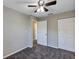 Bedroom with double closets and ceiling fan at 17 Walnut Crse, Ocala, FL 34480