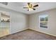 Bright bedroom with view of kitchen and ceiling fan at 17 Walnut Crse, Ocala, FL 34480