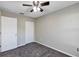 Well-lit bedroom with double closets and ceiling fan at 17 Walnut Crse, Ocala, FL 34480