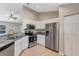 Modern kitchen with stainless steel appliances at 17 Walnut Crse, Ocala, FL 34480