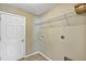 Laundry room with shelving and tile flooring at 17 Walnut Crse, Ocala, FL 34480