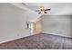 Open concept living room with a view into the kitchen and dining area at 17 Walnut Crse, Ocala, FL 34480