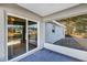 Screened porch with sliding glass doors and view of backyard at 17 Walnut Crse, Ocala, FL 34480
