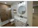 Modern bathroom with a walk-in shower, floating vanity, and stylish fixtures at 205 Hazard St, Orlando, FL 32804