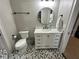 Stylish bathroom with marble vanity and geometric tile at 205 Hazard St, Orlando, FL 32804