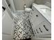 Charming bathroom with patterned tile flooring, a vanity with marble countertop, and modern fixtures at 205 Hazard St, Orlando, FL 32804