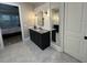 Bathroom showcasing double mirrors above the vanity and doors leading to bedroom and toilet at 205 Hazard St, Orlando, FL 32804